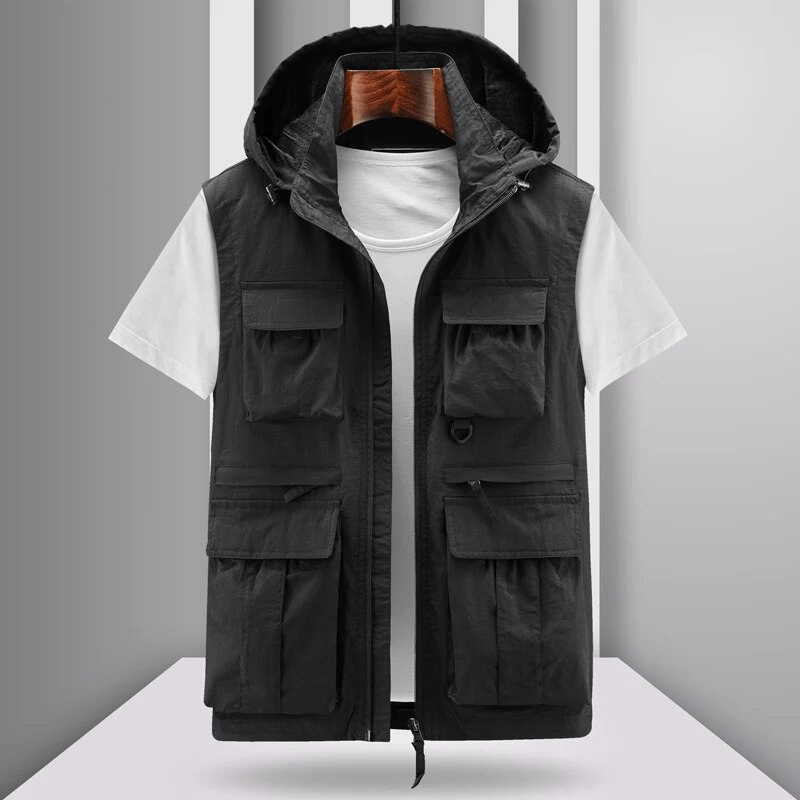 Black lightweight men's vest with multiple pockets and hood for stylish and practical outdoor wear. Zipper closure. SF1786 model.